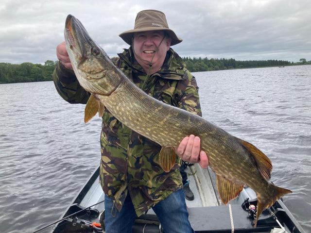 OpenSeason.ie's Kevin McSherry on Lough Derg with a large pike he has caught