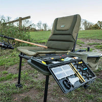 Korum S23 Accessory Chair (Standard) on river bank with accessories (sold separately)
