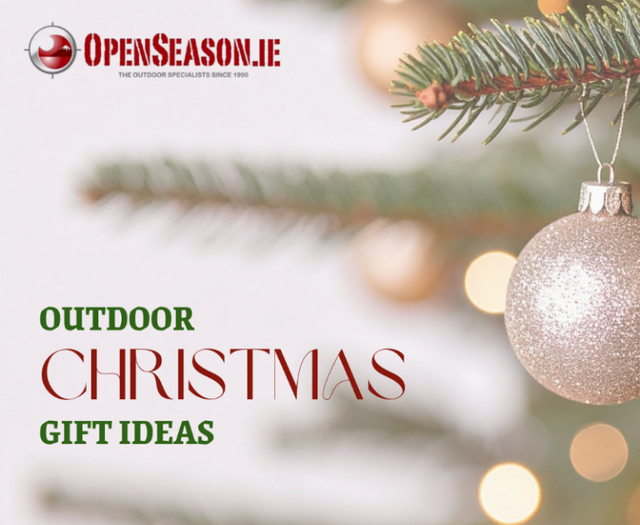 Decorative Christmas ball on a tree branch with 'OpenSeason.ie' text overlay.