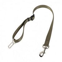 Green car seat belt for dog with metal clip on a white background