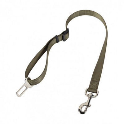 Green car seat belt for dog with metal clip on a white background
